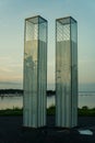 A vertical image of the September 11 Memorial at sunrise