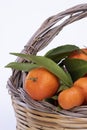 Cose up clementines on wicker basket