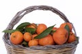 Cose up clementines on wicker basket