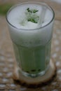 Cose up of a glass of matcha tea