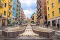 Cosenza, Italy - May 7, 2018: View of modern stairs street via Arabia with fountains, multicolored buildings