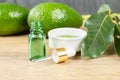 Cosmetic avocado oil in dropper bottle, mock up. Glass bottle.