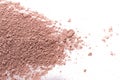 Cosmetic background, minerl clay texture. Pink ask dry clay for facecare and bodycare. Isolated on a white Royalty Free Stock Photo