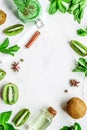 Cosmetic for body with kiwi scrub table background top view mockup