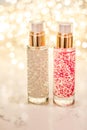 Holiday make-up base gel, serum emulsion, lotion bottle and golden glitter, luxury skin and body care cosmetics for beauty brand Royalty Free Stock Photo