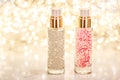 Holiday make-up base gel, serum emulsion, lotion bottle and golden glitter, luxury skin and body care cosmetics for beauty brand Royalty Free Stock Photo