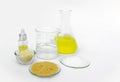 Cosmetic chemicals ingredient on white laboratory table. Carnauba Wax Flakes, Candelilla Wax, Microcrystalline wax, Nickle