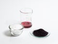 Cosmetic chemicals ingredient on white laboratory table. Potassium Permanganate Liquid, KMnO4, Microcrystalline wax