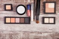 Cosmetic compacts and applicators