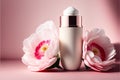 Cosmetic cream bottle with pink peony flowers on a pink background