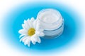 Cosmetic cream and chamomile flower, skin care concept, herbal beauty product in dermatology Royalty Free Stock Photo