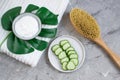 Cosmetic cream, face mask, scrub, cucumber, white bath towel Royalty Free Stock Photo