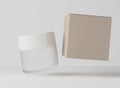 Cosmetic cream jar with white cpastic lid and brown paper box, care product packaging and branding mockup 3D render Royalty Free Stock Photo