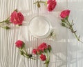 Cosmetic cream, roses, white wooden Royalty Free Stock Photo