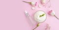 Cosmetic cream, relaxation wellness rose flower on a colored background