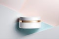 Cosmetic cream in a white container on a colorful background. Pastel colors