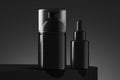 Cosmetic dispenser for cream, gel, lotion and dropper for oil. Beauty product package, black container. 3d rendering.