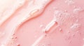 Cosmetic essence forming bubbles on pink liquid surface Royalty Free Stock Photo