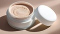 Cosmetic cream, face powder in a jar on a beige background with shadows