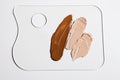 Cosmetic foundation palette on white background Royalty Free Stock Photo