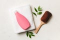 cosmetic for hair care, cream and towel on a colored background top view. flat lay Royalty Free Stock Photo