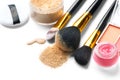 Cosmetic liquid foundation or cream, loose face powder, various brushes for apply makeup. Make up concealer smear Royalty Free Stock Photo