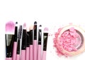 Cosmetic powder brush circle box and crushed blush palette on white. Royalty Free Stock Photo