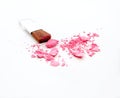 Cosmetic powder brush and crushed blush isolated on white Royalty Free Stock Photo