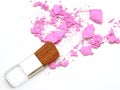 Cosmetic powder brush and crushed powder on white Royalty Free Stock Photo