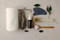 Cosmetic product for facials. Concept of natural cosmetics - black stone gouache, cotton towel, brush with natural bristles, serum Royalty Free Stock Photo