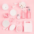 Cosmetic products for bathroom, health and hygiene in modern girlish style - decorative heart, soap, bath salt, essential oil. Royalty Free Stock Photo