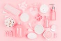 Cosmetic products for bathroom, health and hygiene in modern girlish style - decorative heart, soap, bath salt, essential oil. Royalty Free Stock Photo