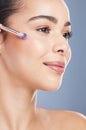 Cosmetic, profile and woman with makeup brush for natural, glamour and facial routine in studio. Self care, beauty and