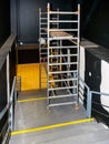 Cosmetic repair of the stairwell walls using modern metallic tubular multilevel scaffolding