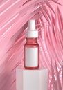 Cosmetic serum bottle mockup product with empty blank label on white stage and pink pastel leaves background. Health and makeup Royalty Free Stock Photo