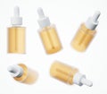 Cosmetic serum bottle with pipette mockup 3D render, skin care yellow oil dropper in several views, beauty business