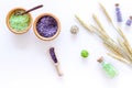 Cosmetic set with wheat herbs and sea salt in bottle on white table background flat lay Royalty Free Stock Photo