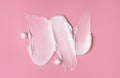 Cosmetic smear of cream texture on a pink background. Skin care