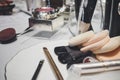 Cosmetic tools. Various types of make up brushes and sponge scattered on the make up table. Vintage filmed grained filter applied Royalty Free Stock Photo