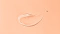 Cosmetic transparent gel serum swatch with bubbles isolated on color 2024 yesr Peach Fuzz background Royalty Free Stock Photo