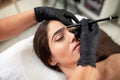 Cosmetician preparing to make a legit appearance of naturally full brows