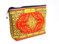 Cosmetics bag with multycolored pattern.