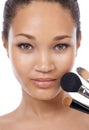 Cosmetics, brushes and portrait of woman or model in studio for beauty, foundation and makeup. Closeup, face and young