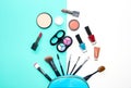 Cosmetics and fashion background with make up artist objects: lipstick, eye shadows, mascara ,eyeliner, concealer, nail polish. b Royalty Free Stock Photo