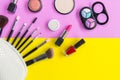 Cosmetics and fashion background with make up artist objects: lipstick, eye shadows, mascara ,eyeliner, concealer, nail polish. Royalty Free Stock Photo