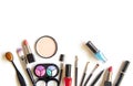 Cosmetics and fashion background with make up artist objects: lipstick, eye shadows, mascara ,eyeliner, concealer, nail polish. Royalty Free Stock Photo