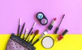 Cosmetics and fashion background with make up artist objects: lipstick, eye shadows, mascara ,eyeliner, concealer, nail polish Royalty Free Stock Photo