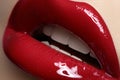 Cosmetics. Fashion bright red cherry lips glossy make-up, pout Royalty Free Stock Photo