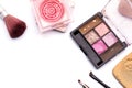 Cosmetics and make-up accessories that have been used Placed on a white table top view Royalty Free Stock Photo