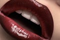 Cosmetics & makeup. Closeup fashion cherry lips glossy make-up
